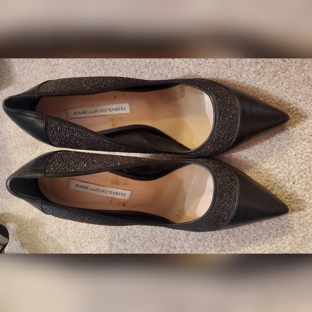 Gold and black heels
